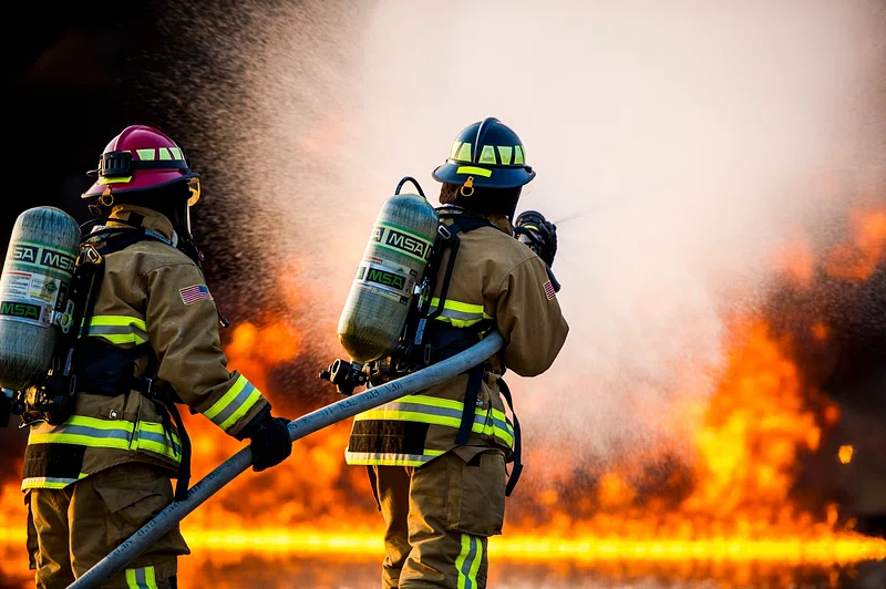 Firefighters battling structure fire - Republic Adjusters fire and smoke damage public adjusters Florida