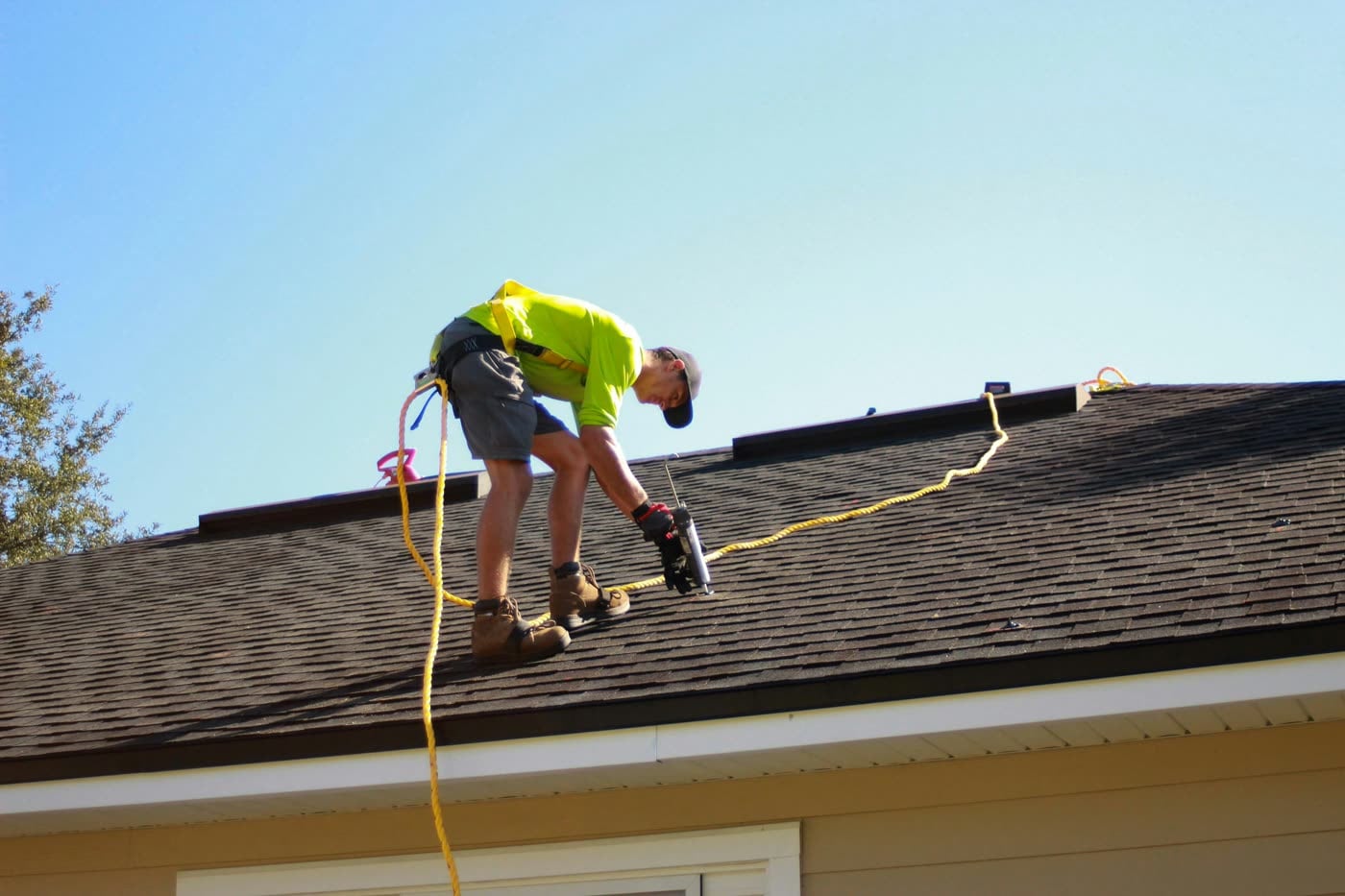 Roofing contractor inspecting Florida roof damage - Republic Adjusters roof damage public adjusters