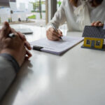 Florida homeowner reviewing a Citizens Property Insurance claim and policy documents