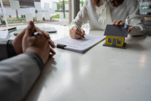 Florida homeowner reviewing a Citizens Property Insurance claim and policy documents