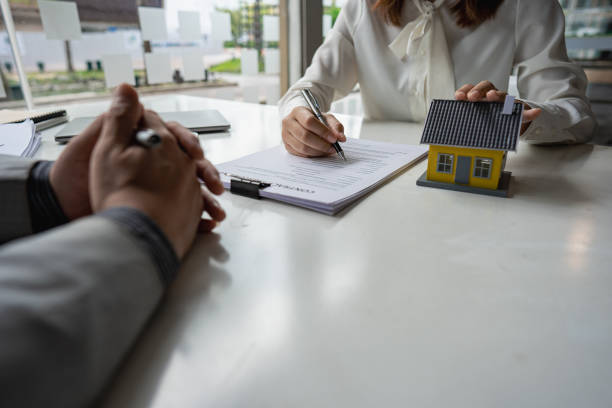 Florida homeowner reviewing a Citizens Property Insurance claim and policy documents